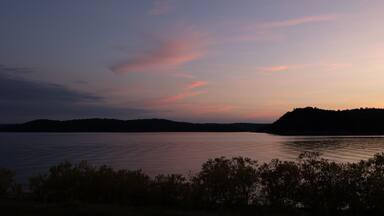 Beautiful lakeside view with sky night and day