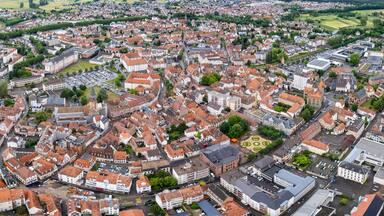 Panorama aerial view of the old town of the city Haguenau in France on a sunny noon in summer