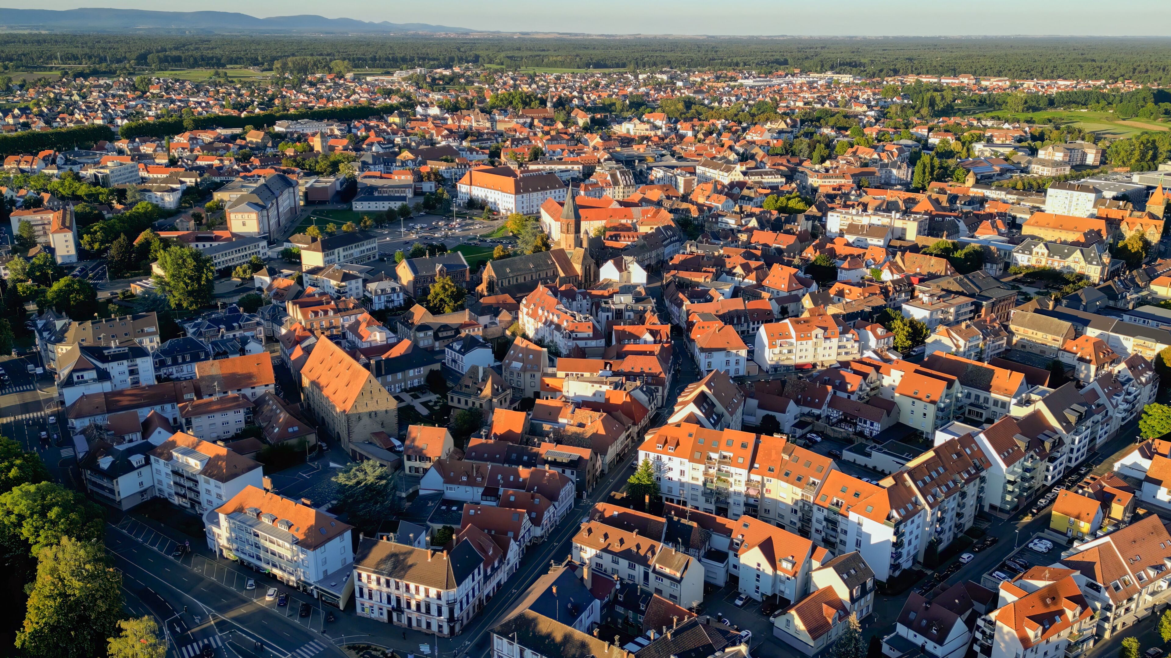 Aerial panoramic view of the city Haguenau in France on a sunny spring afternoon.