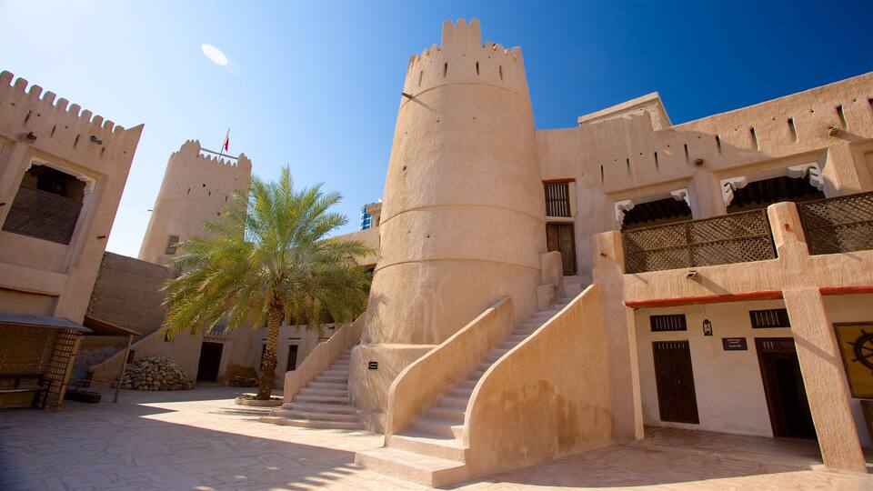 Ajman featuring desert views and heritage architecture