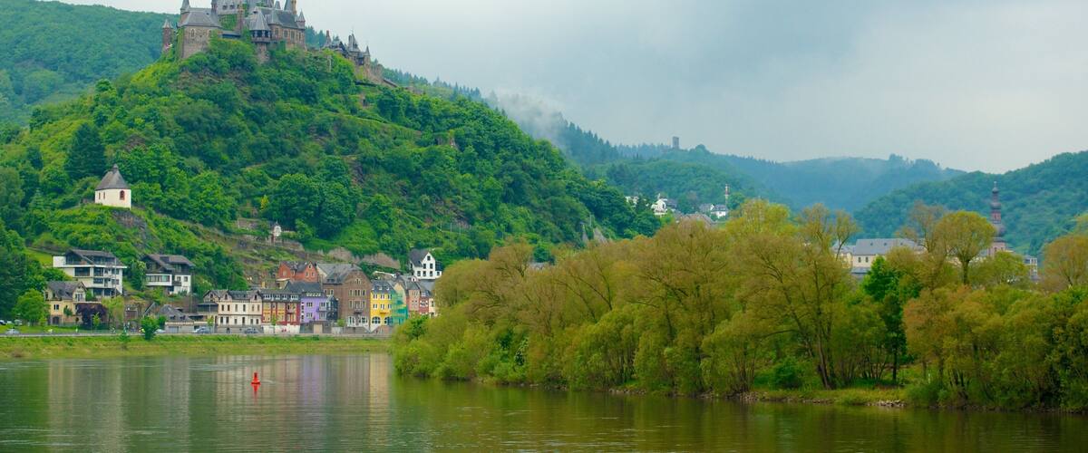 Cochem which includes chateau or palace, tranquil scenes and mountains