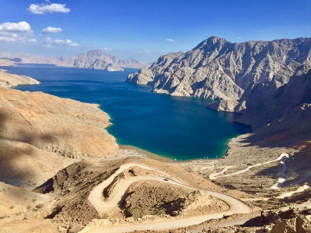 Driving on dirt roads on Khasab mountains led us to this beautiful spot. A tiny nook with fishing boats anchored... 