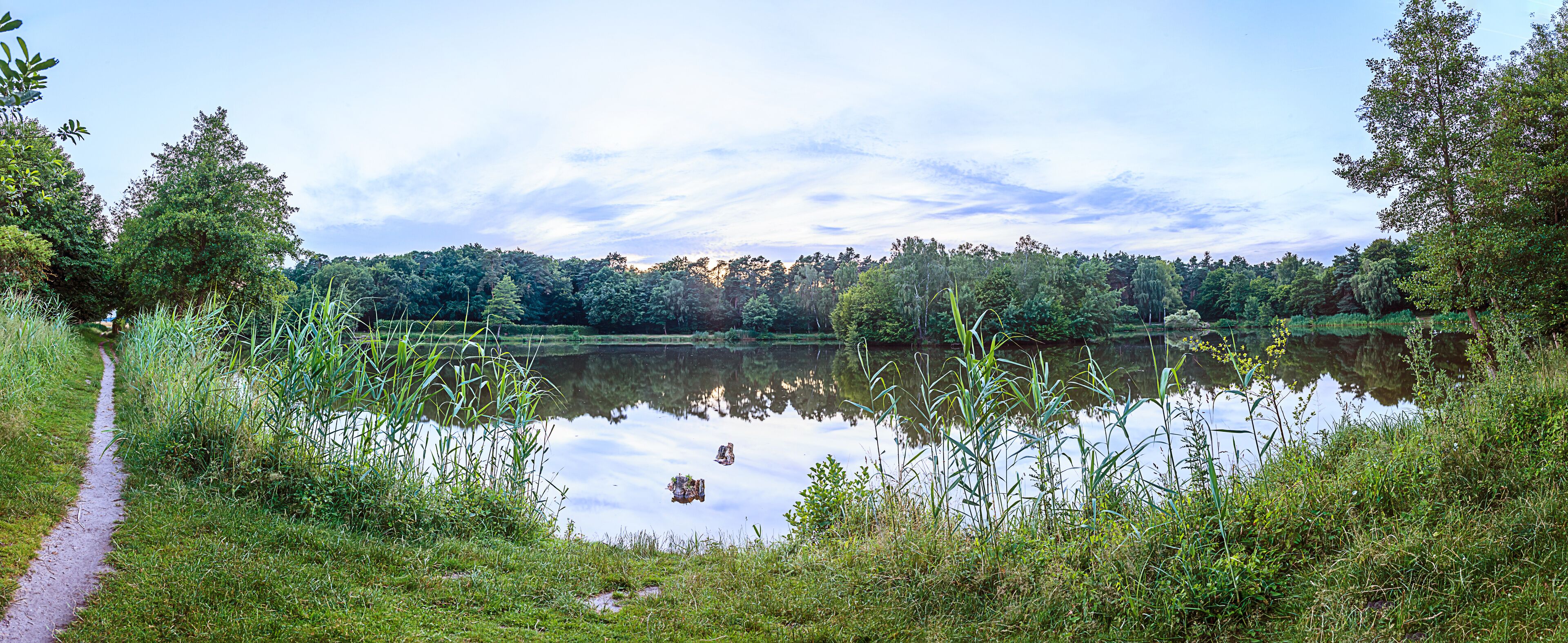 Panorama picture of lake in Gundwiesen recreation area close to Frankfurt airport