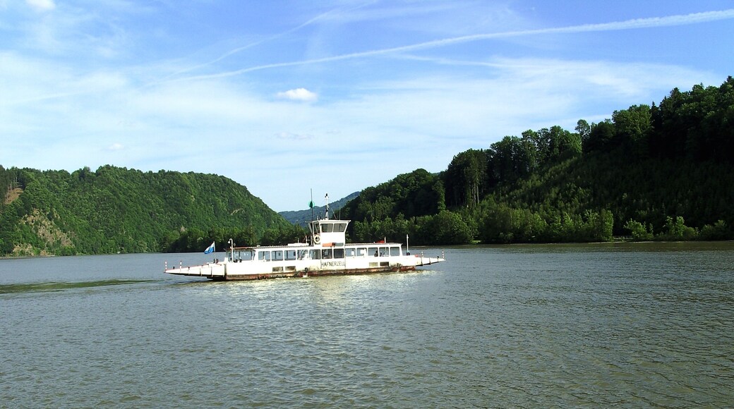 A ferry on the danube at the German-Austrian border region. On the other side of the river is Austria.