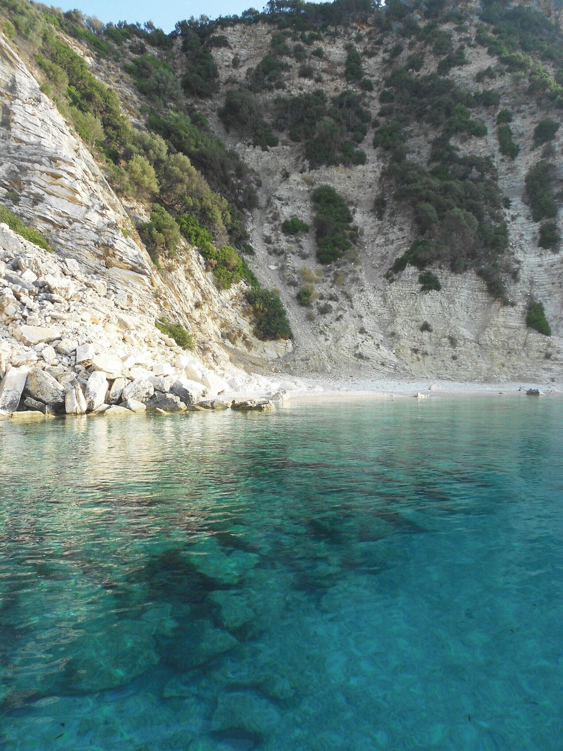 A secluded spot where we anchored the catamaran. We stayed overnight on the boat and swam the whole day in this beautifully clear water