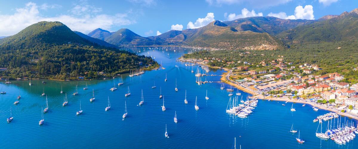 Aerial drone bird's eye view photo of iconic port of Nidri or Nydri, Leflkada island, Ionian, Greece