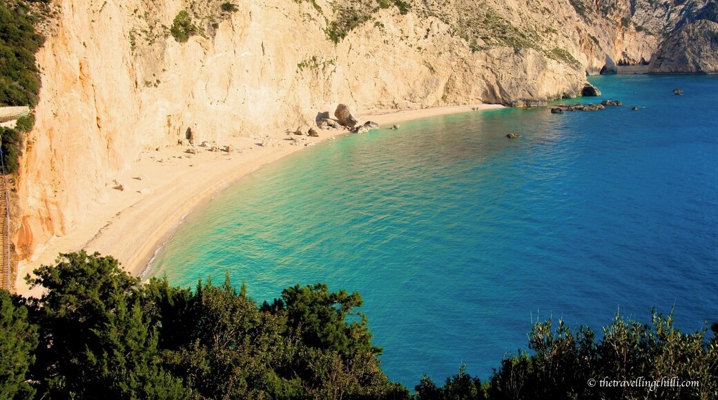 The beach of Porto Katsiki on the Ionian island of Levkada is considered to be one of the best beaches in Greece. It's location is fabulous. Porto Katsiki means "Port of goat", named like this because only a goat used to be able to reach this beach. Now there is a paved road, but nevertheless a very narrow path. From the parking lot you can get down by a long staircase. It's a pebbled beach and in peak season it can get very crowded. We were lucky to be alone on this #beach