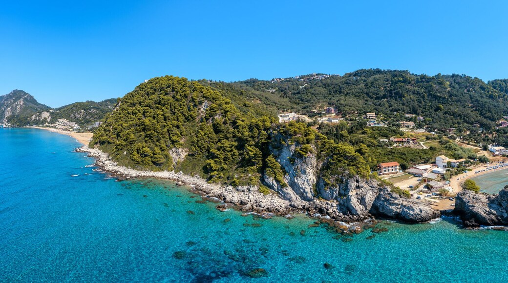 Aerial drone view over western coast and Glyfada beach, Island of Corfu, Greece. Glyfada Beach at Corfu Greece during the day.