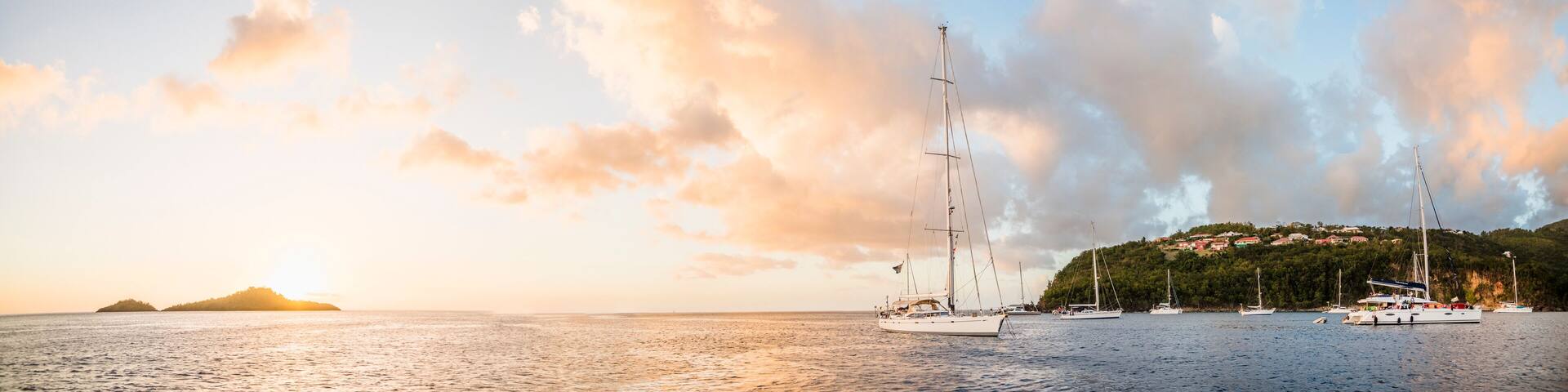 Sailboats anchored in sea, Bouillante, Basse Terre, Guadeloupe