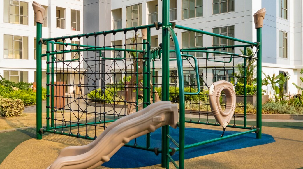 Tangerang, Indonesia - 6th Sep 2019: Playground with slide in M-Town Residences apartment buildings in Summarecon Serpong, Tangerang, Indonesia.