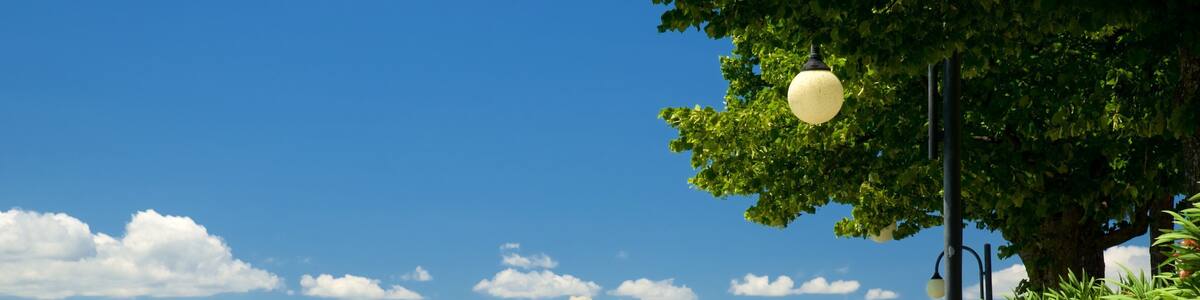 Passignano sul Trasimeno showing outdoor art and a river or creek