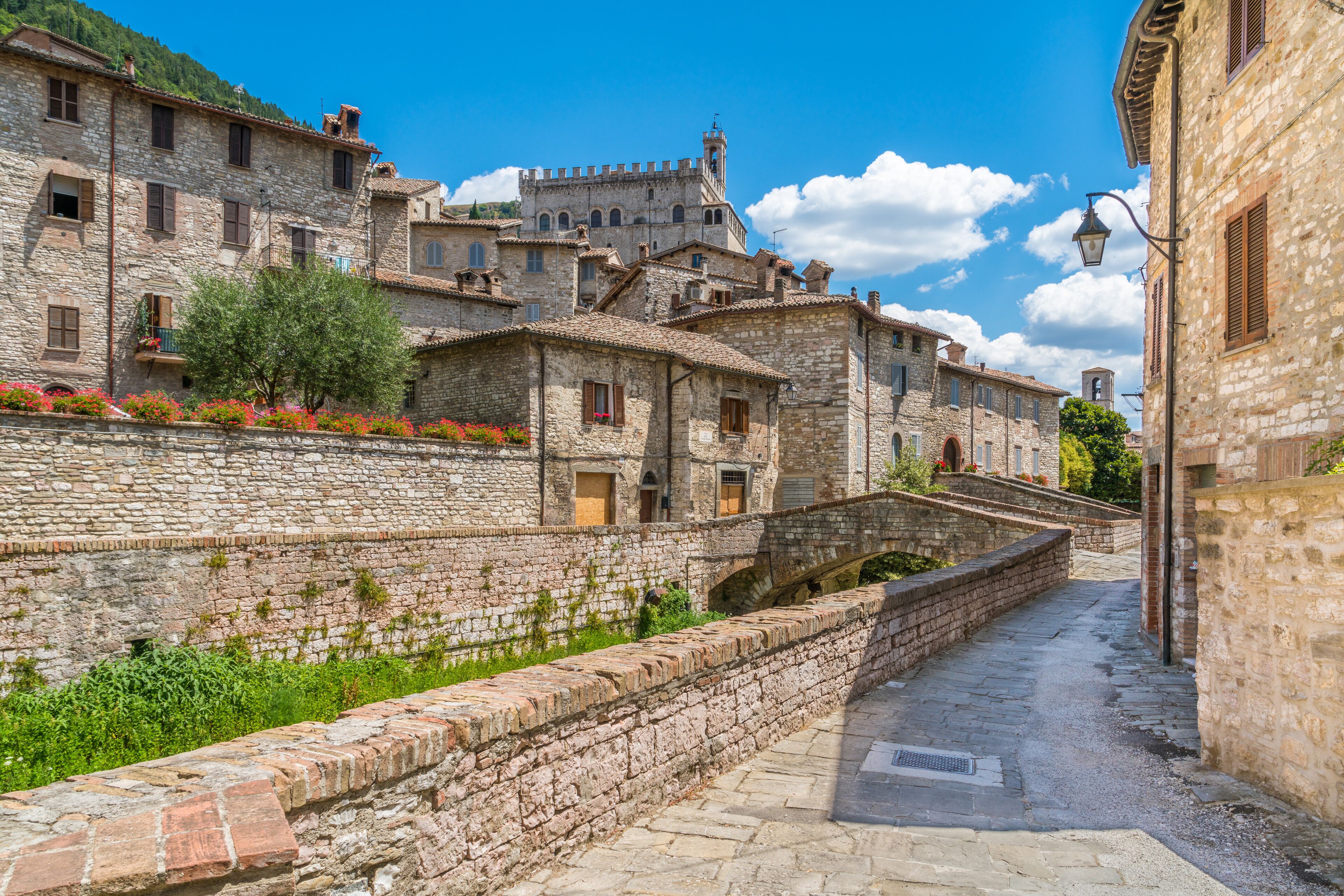 Scenic sight in Gubbio with Palazzo dei Consoli, medieval town in the Province of Perugia, Umbria, central Italy.