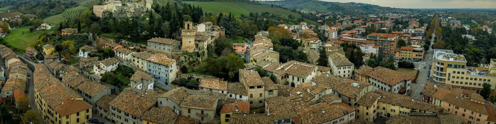 Aerial panorama view of Castrocaro di Terme, famous Italian thermal spa town in Cesena-Forli province, Emilia Romagna, near Terra del Sole, home to a Medici fortress castle in ruins a famous bridge