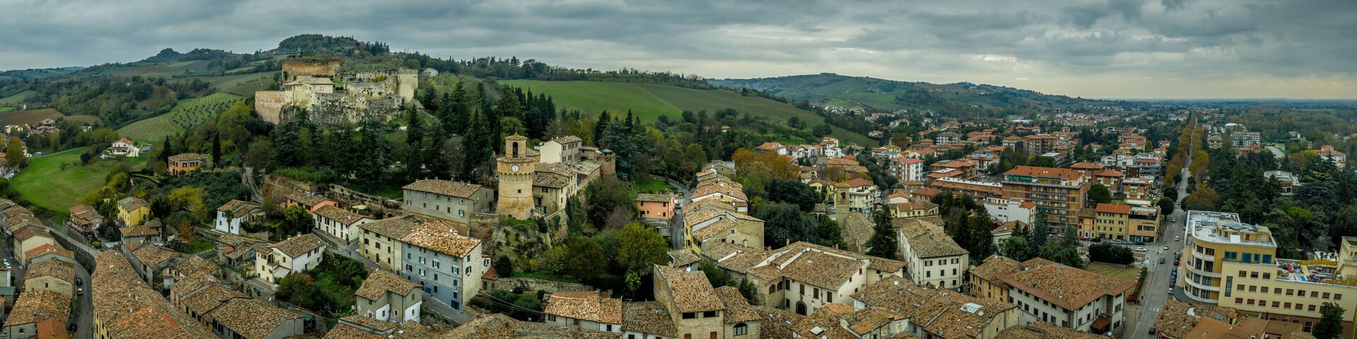 Aerial panorama view of Castrocaro di Terme, famous Italian thermal spa town in Cesena-Forli province, Emilia Romagna, near Terra del Sole, home to a Medici fortress castle in ruins a famous bridge