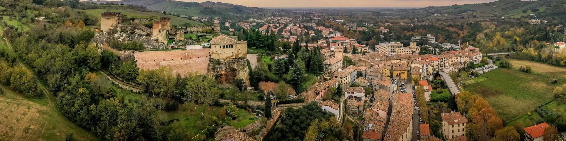 Aerial panorama view of Castrocaro di Terme, famous Italian thermal spa town in Cesena-Forli province, Emilia Romagna, near Terra del Sole, home to a Medici fortress castle in ruins a famous bridge