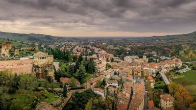 Aerial panorama view of Castrocaro di Terme, famous Italian thermal spa town in Cesena-Forli province, Emilia Romagna, near Terra del Sole, home to a Medici fortress castle in ruins a famous bridge