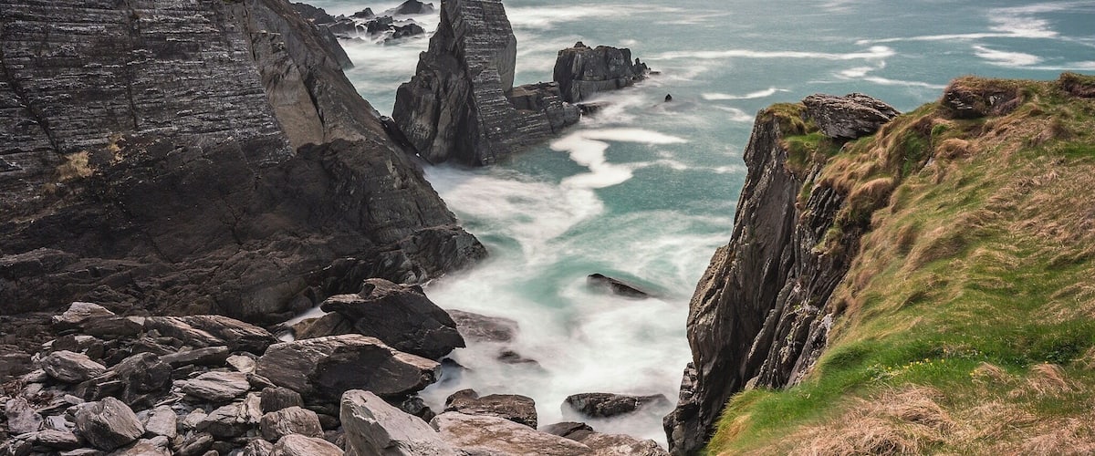 A little cove at 3 Castle Head on the Mizen Peninsular. Long Exposure to exaggerate the wave movements within the cove and on the surrounding rocks.
