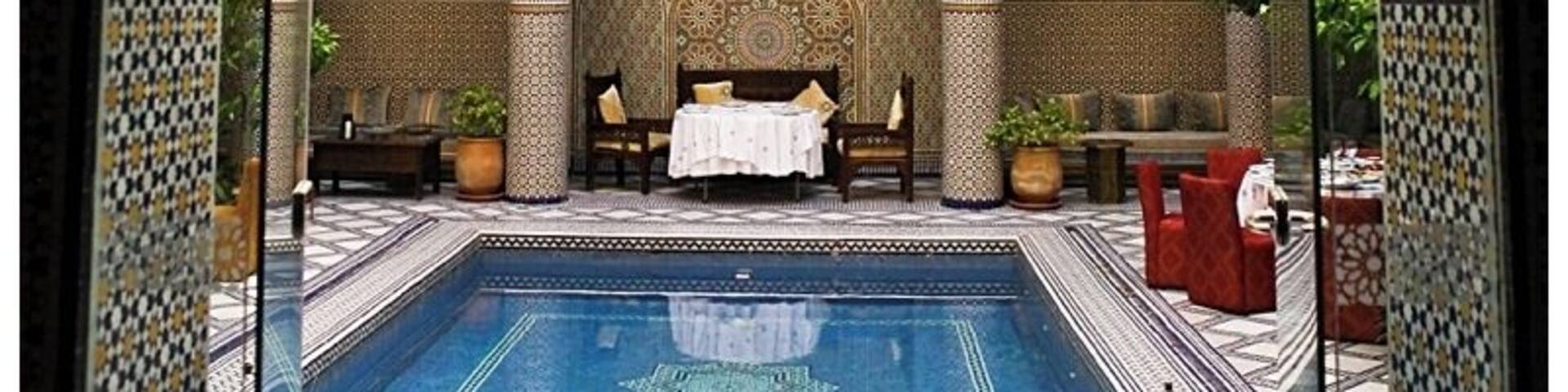 Tucked away on one of the many side streets of Fes, with an unassuming door and front is the amazing Riad Salam Fes.
A luxury riad nestled in the old medina of Fes, which is a UNESCO world heritage site, is walking distance to so much of the old medina to discover - shopping, foods, markets, restaurants.
This is where we ate breakfast in the morning. I know...hard to handle ;)