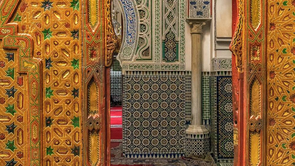 Kairaouine Mosque, Fez, Morocco. One of the largest in Africa, and among the oldest universities in the world, the mosque dates to the year 859. It's an incredible, ornate jewel of a complex located in the center of the dark, dirty, chaotic old media of Fez. They open the doors to allow tourists a peak inside. Also, great opportunities for pick pockets to make some cash! My iPhone was stolen from my shoulder bag while taking this picture. I was too distracted by the amazing decor!