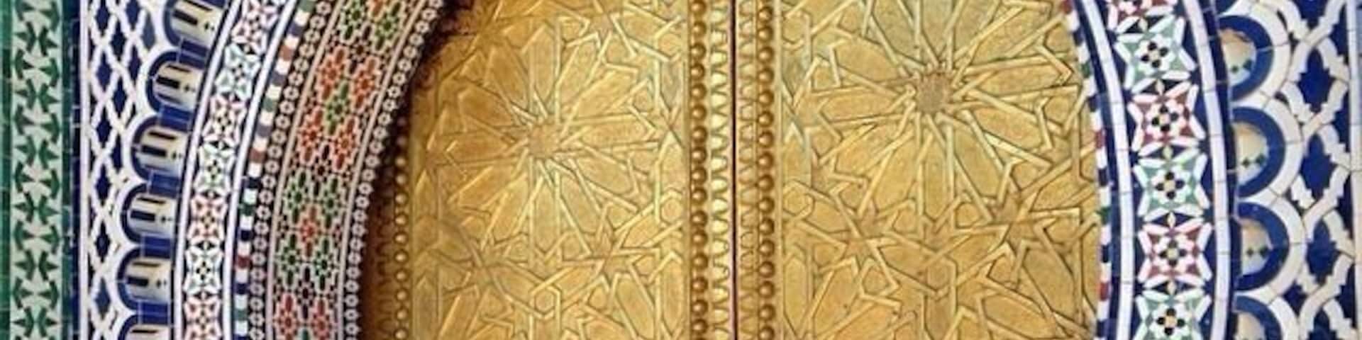 One of the main doors into the Royal Palace in Fez. These doors are very intricately detailed and one of our favorite in Fez.
Be sure not to take any pictures of the guards as they will make you delete the photo as one tourist found the hard way.
When visiting Fez, be sure to get a guide to learn the lay of the land and have less haggling from the locals. Don't trust individuals who say they are guides without appropriate credentials. It can be very easy to get lost in the maze of 9000 streets/alleys even when you have a great sense of direction.
Fez is a must see when in Morocco.
#architecture #colorful