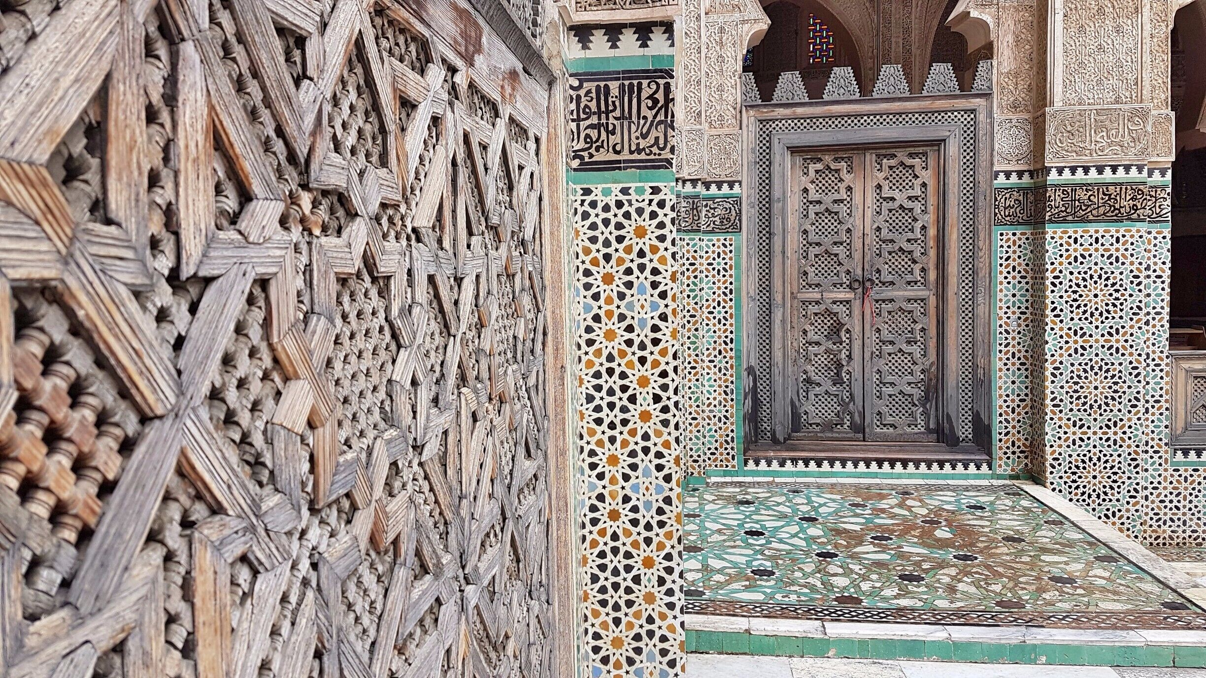 Beautiful madrasa in the middle of the medina with intricate wood, plaster and mosaic work surrounding the large courtyard.

#fes #oldcity #morocco