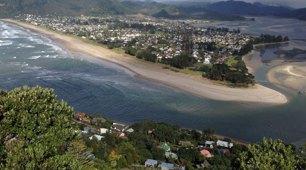 Nearing the top of Mount Paku Summit, the view opened up to this lovely view of the distant mountain and across the shallow harbour.
