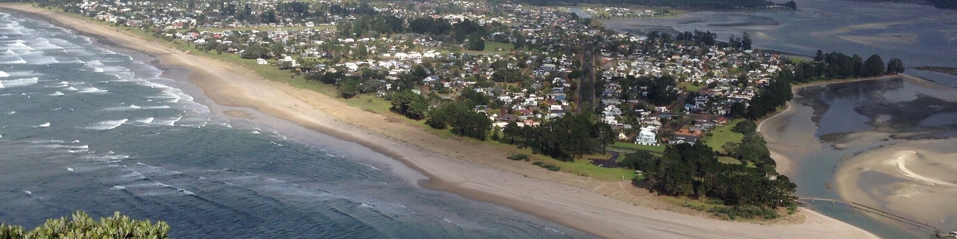 Nearing the top of Mount Paku Summit, the view opened up to this lovely view of the distant mountain and across the shallow harbour.