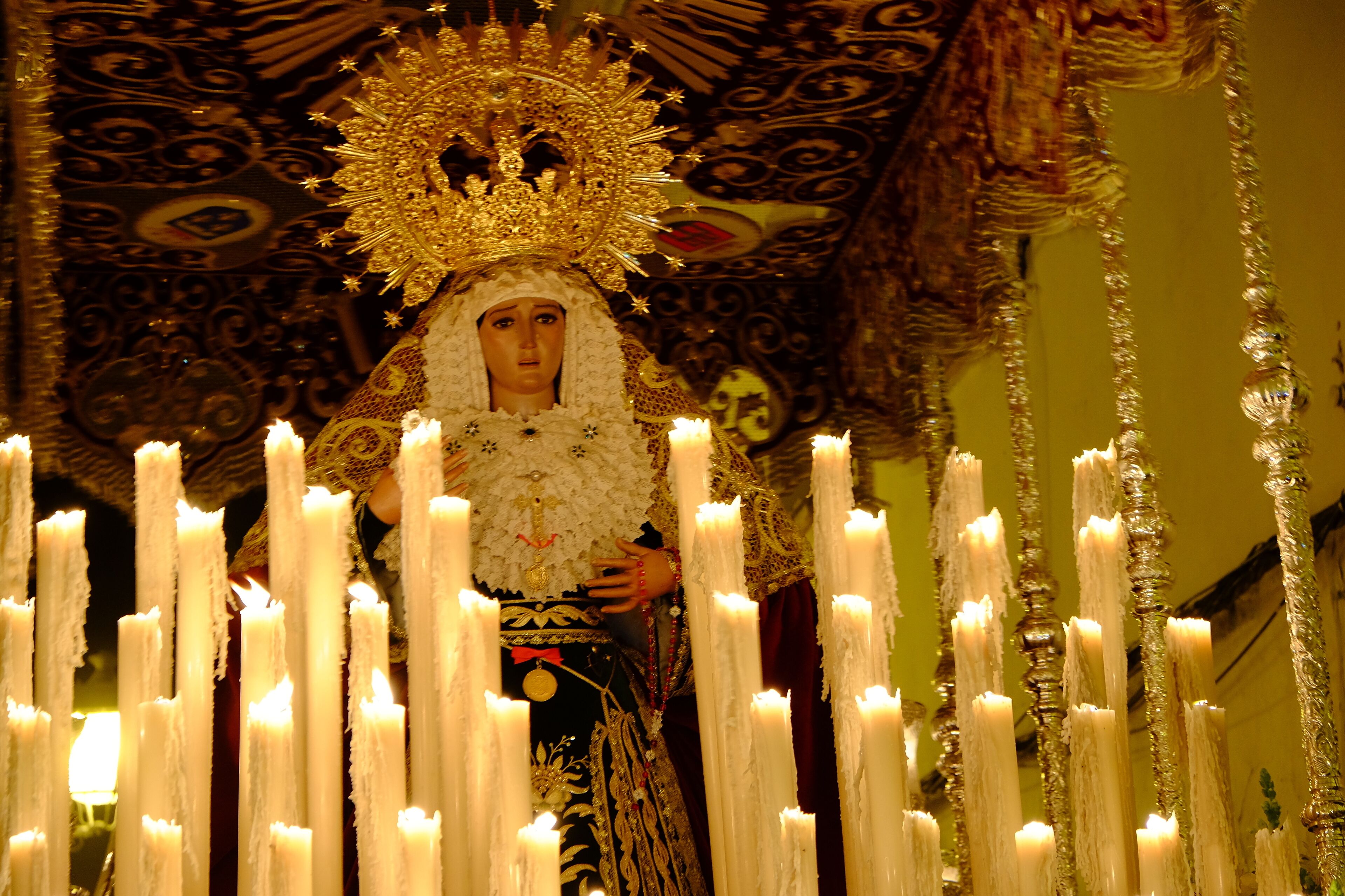 Holy Mary of Sorrows carried by the members of the Hermandad de Nuestro Padre Jesús de las Tres Caídas y María Santísima de la Amargura, during a Holy Week night procession through the streets of Arcos de la Frontera (Andalusia, Spain).