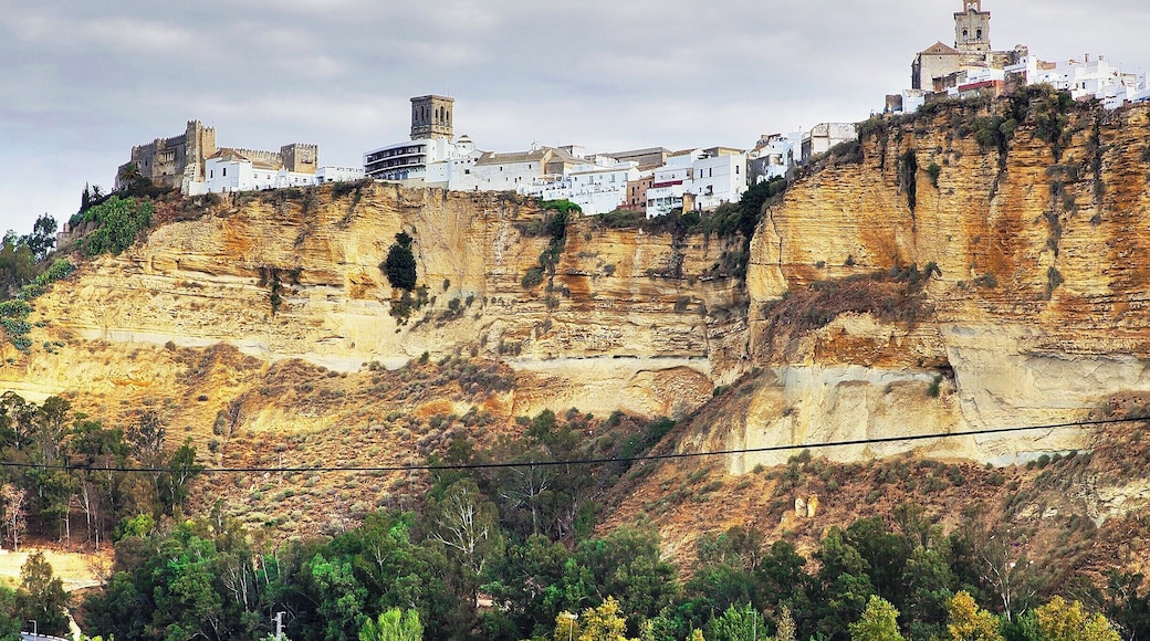 Arcos sits dramatically perched atop a defensible limestone ridge. Makes since, given that it came to prominence as a frontier town for the Moors in the 12th century. The old town is a charming mix of whitewashed houses and stone walls set amid a labyrinth of narrow, cobbled streets. Stay a night or two at a small hotel in the old town and spend the day wandering about.