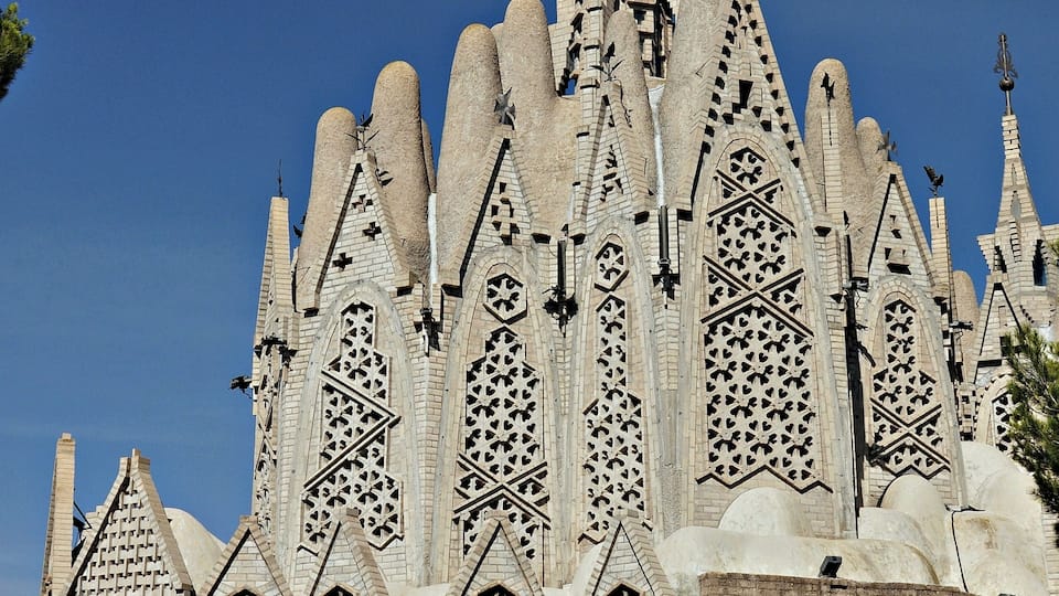 A Gothic-style church with intricate stonework and pointed arches.