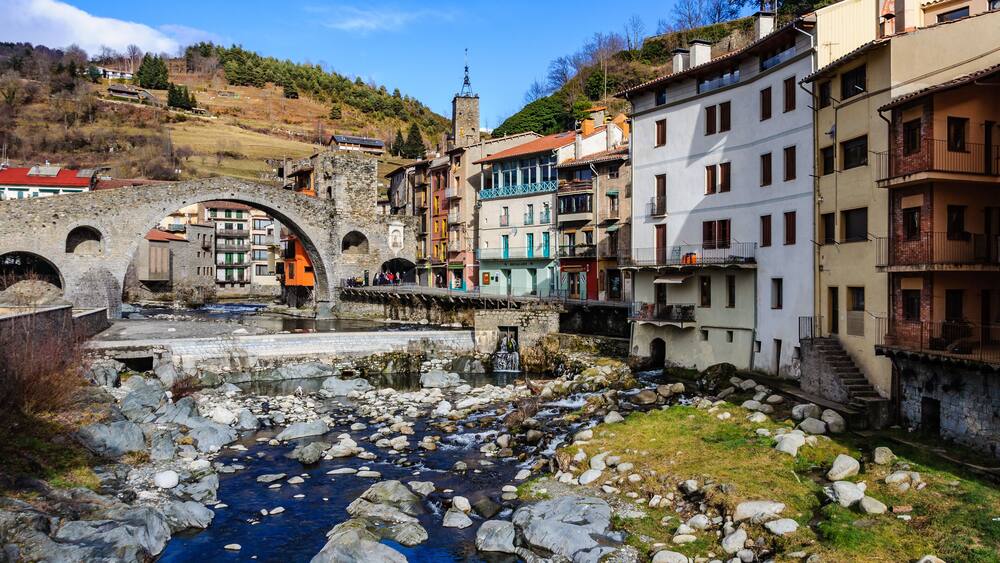 Stone bridge and river in the medieval Catalan village of Camprodon, Spain
