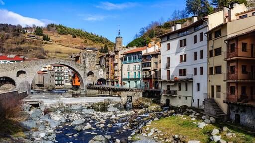 Stone bridge and river in the medieval Catalan village of Camprodon, Spain
