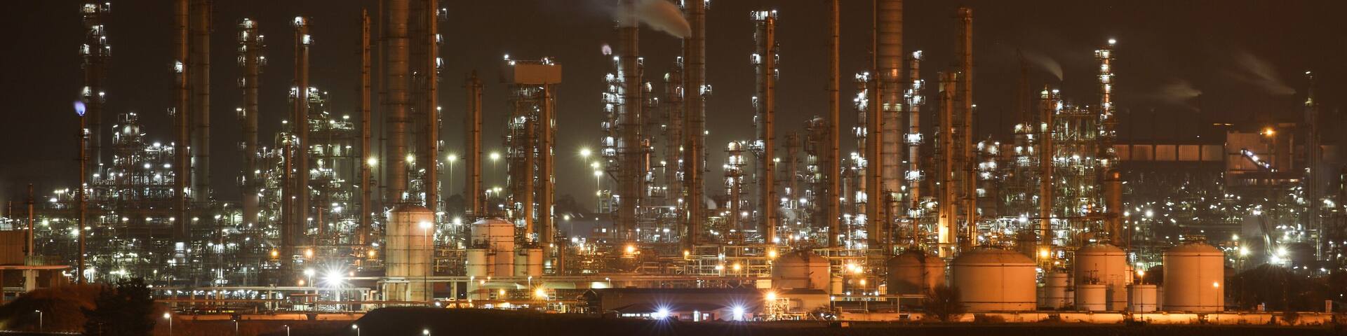 Sasol petrochemical refinery in Secunda, South Africa, at night while the flares burn brightly