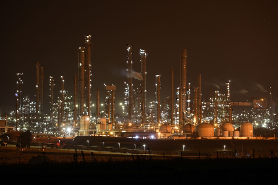 Sasol petrochemical refinery in Secunda, South Africa, at night while the flares burn brightly