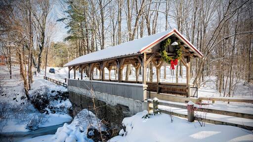 Old Stage Road Bridge straddles the Taylor River between Hampton Falls and Hampton, New Hampshire. Each town owns one half of the bridge, which connects two large conservation open spaces, Applecrest Orchards in Hampton Falls and the Hurd Dairy Farm in Hampton. A dam and waterfall grace the site.