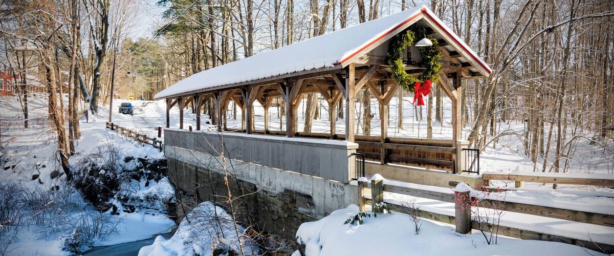 Old Stage Road Bridge straddles the Taylor River between Hampton Falls and Hampton, New Hampshire. Each town owns one half of the bridge, which connects two large conservation open spaces, Applecrest Orchards in Hampton Falls and the Hurd Dairy Farm in Hampton. A dam and waterfall grace the site.