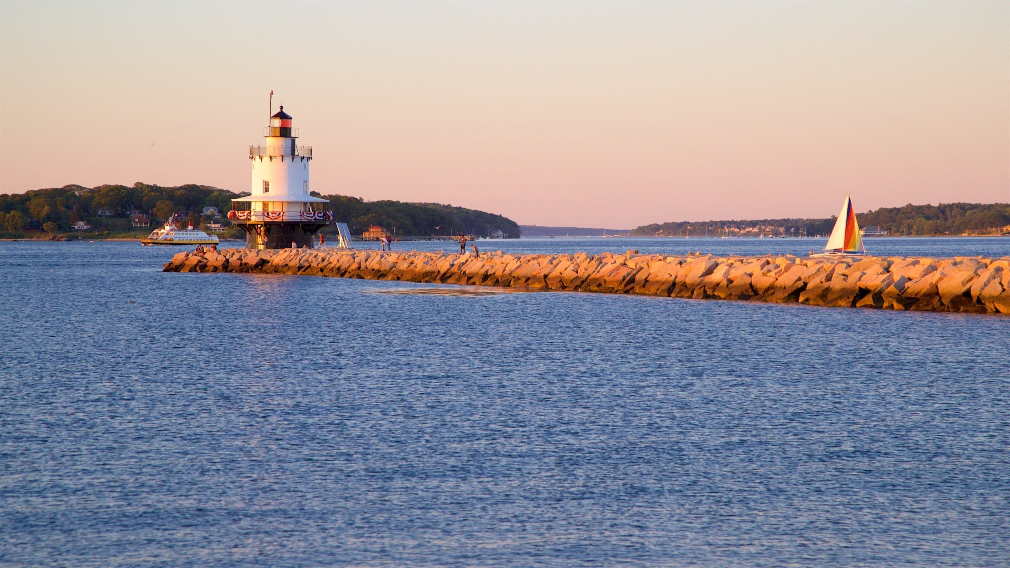 Spring Point Ledge Light showing a sunset, general coastal views and a lighthouse