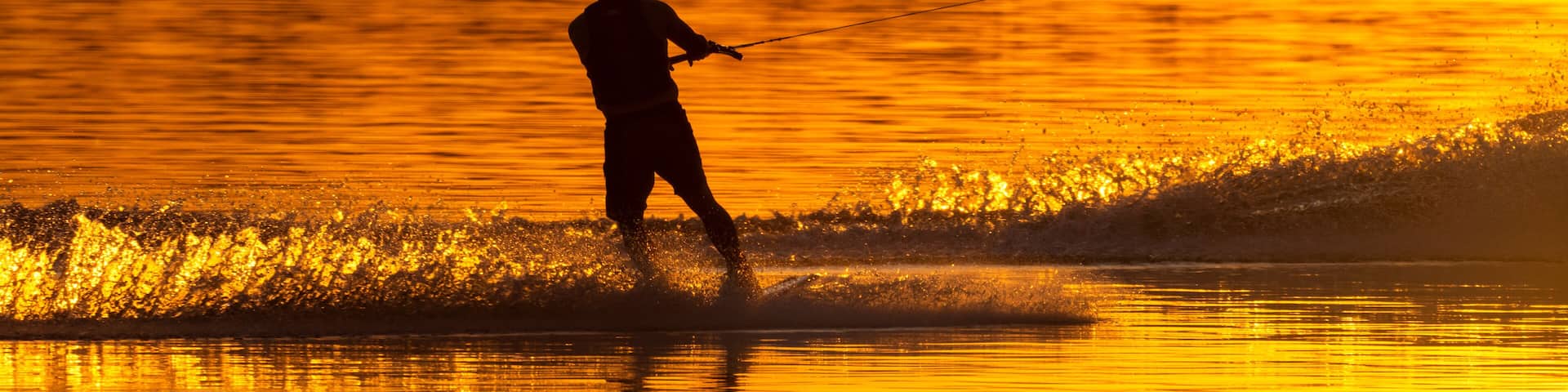 Silhouette of water skier at sunset on a Wisconsin Lake.