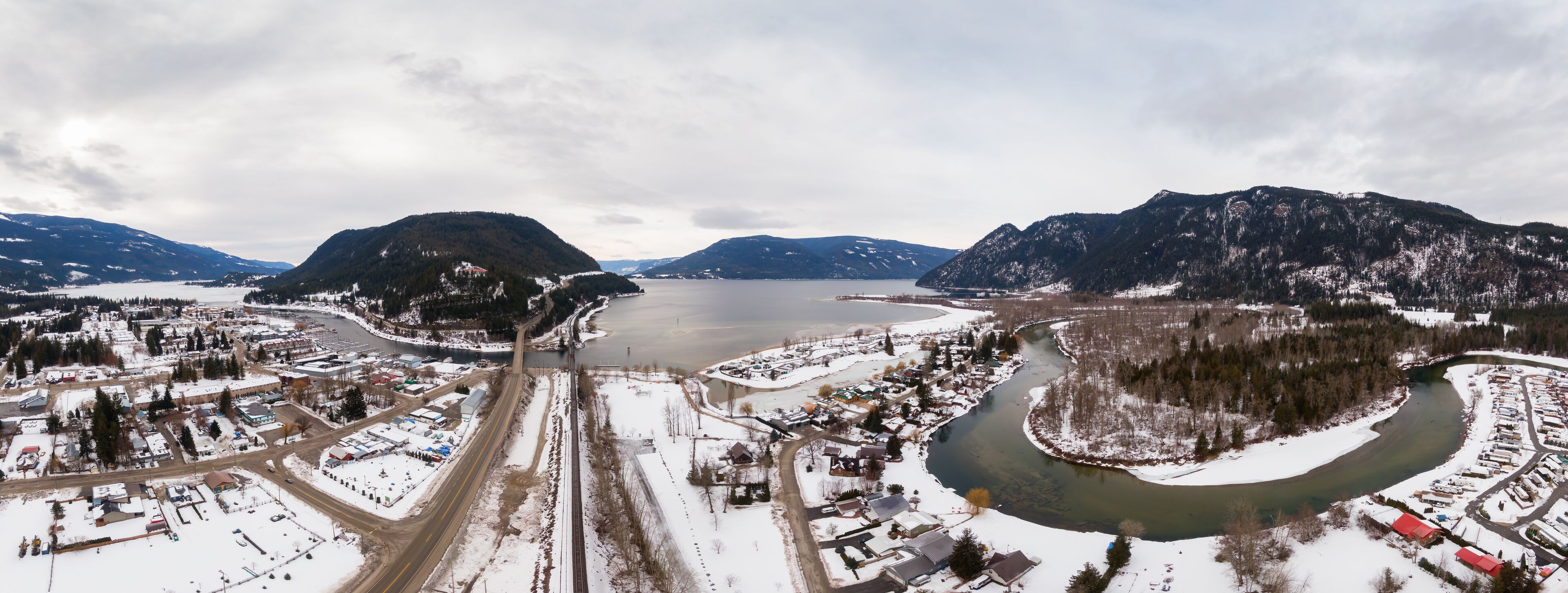 Aerial Panoramic View of a small Town, Sicamous, in the Interior of British Columbia, Canada. Taken during winter time.