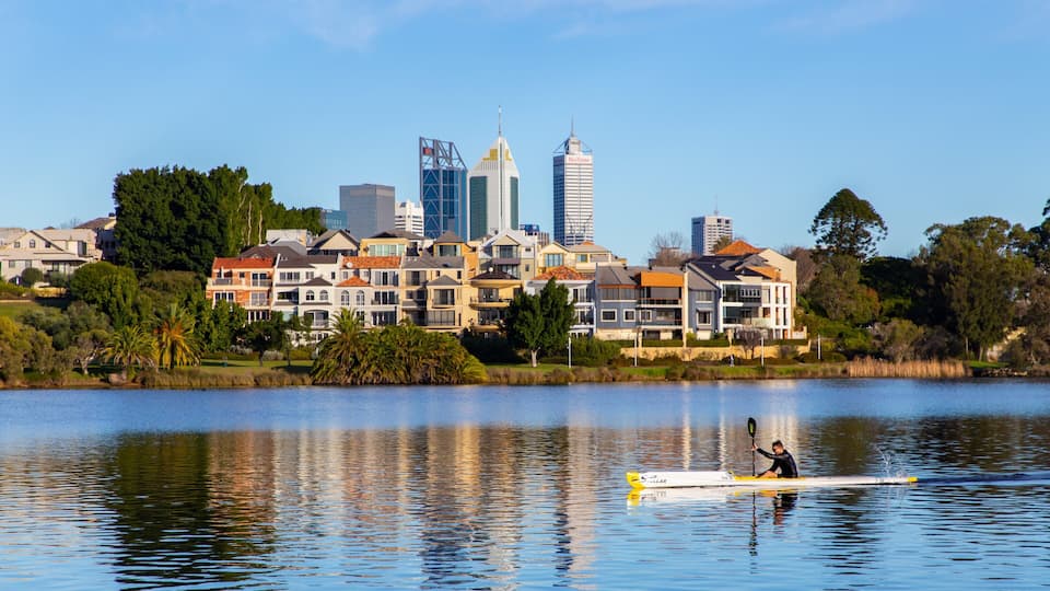 East Perth showing kayaking or canoeing and a river or creek as well as an individual male