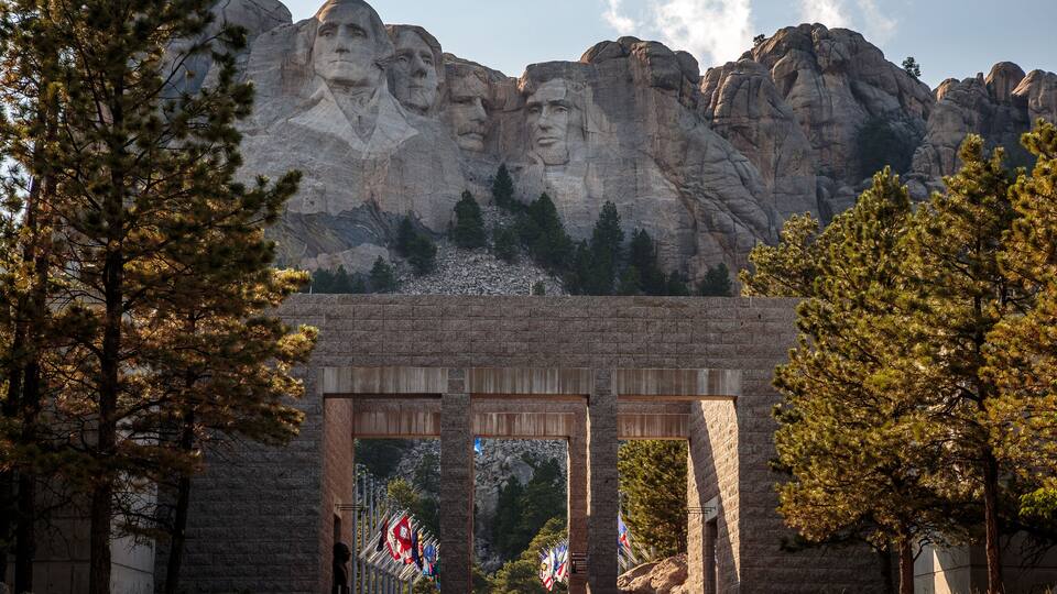 Mount Rushmore National Memorial with four presidential faces carved into the mountain.