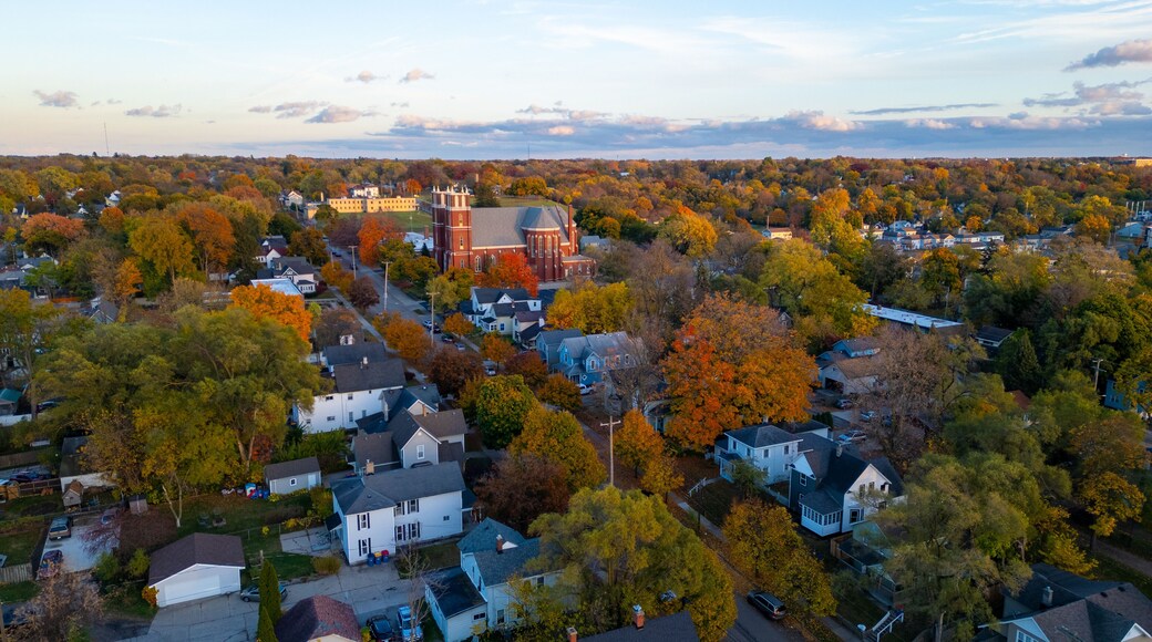 Aerial fall view of town and church in Grand Rapids Michigan