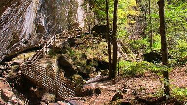 Sunlight shines on cliffs of Maquoketa Caves State Park in Iowa