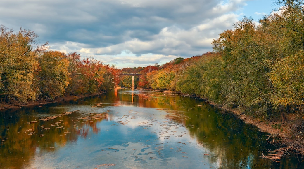 Monocacy River and a railway bridge on the background in autumn