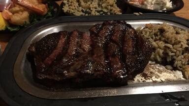 In the middle of Jackson county Minnesota surrounded by endless fields of corn and soybeans, resides a steak house that locals across the region drive hours to come eat at. Bergen, Minnesota is hardly a town, more like four farm houses that sit at a crossroad with a Norwegian sign that reads "Velkommen". The sirloins, ribeye, and New York strips are fresh, juicy staples of bovine Midwest meat. People sip on Schell beer (brewed from nearby New Ulm) on the patio while they wait for their names to be called inside to dine. For a venture into the country and an excellent culinary experience, Bergen is worth checking out.