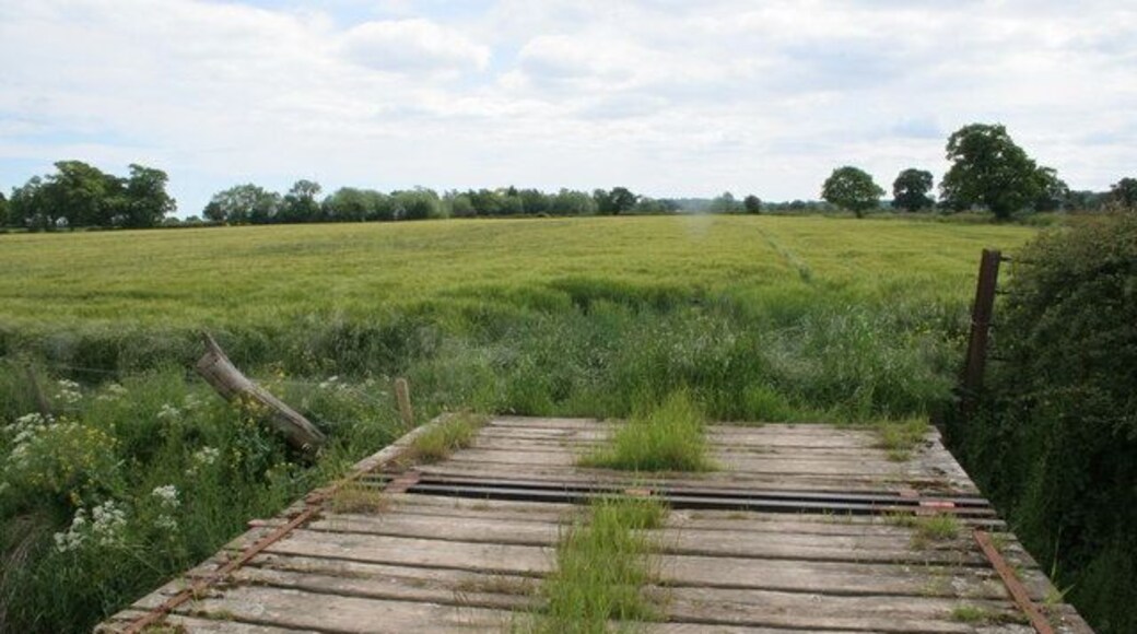 Bridge to Golden Grove This bridge leads to the public footpath across the field to the 13th Century Golden Grove pub which is to the far left of the picture.