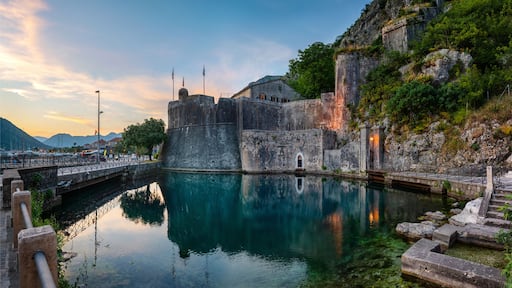 Panoramic view of south (Gurdic) gate, ancient fortress in Old Town of Kotor. Kotor, Montenegro. Evening panoramic view.