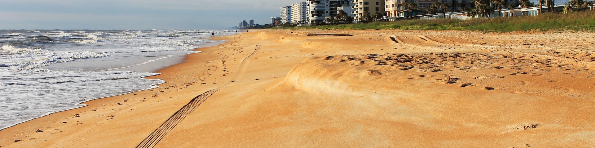 Looking south along Ormond Beach, Florida. Ocean to the left, hotels and condo buildings to the right.