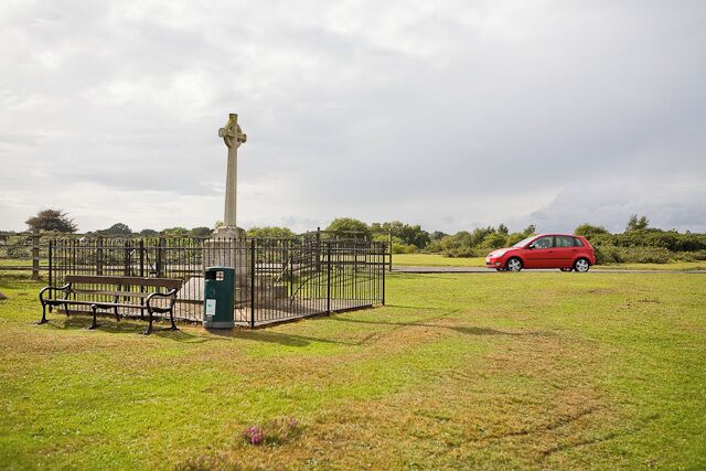 War Memorial. To those who fell in World War I only. The road bayond is the B3055. Compared with 76007 the bushes have gone. For closer view see 1451954.