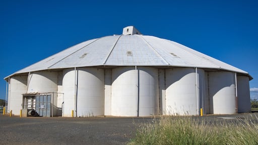 Group of White Grain Silos in a Small Country Town